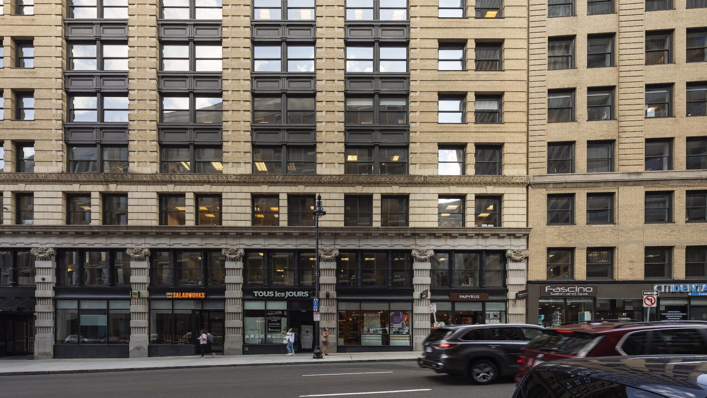 18 Tremont building facade with cars on street