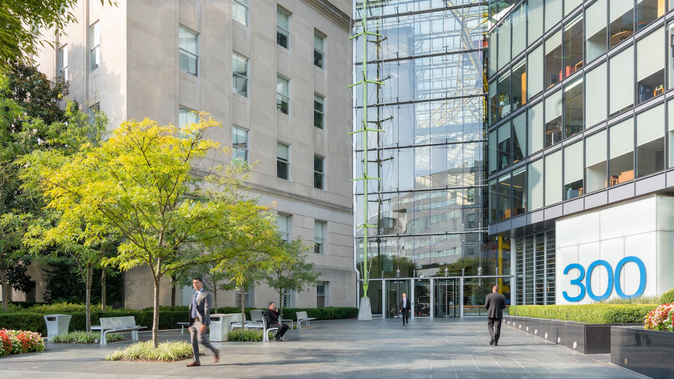 People walk outside America's Square entrance