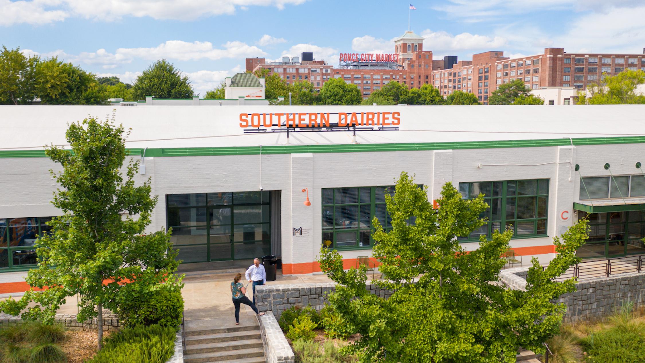 Southern Dairies at Ponce City Market with two people talking outside