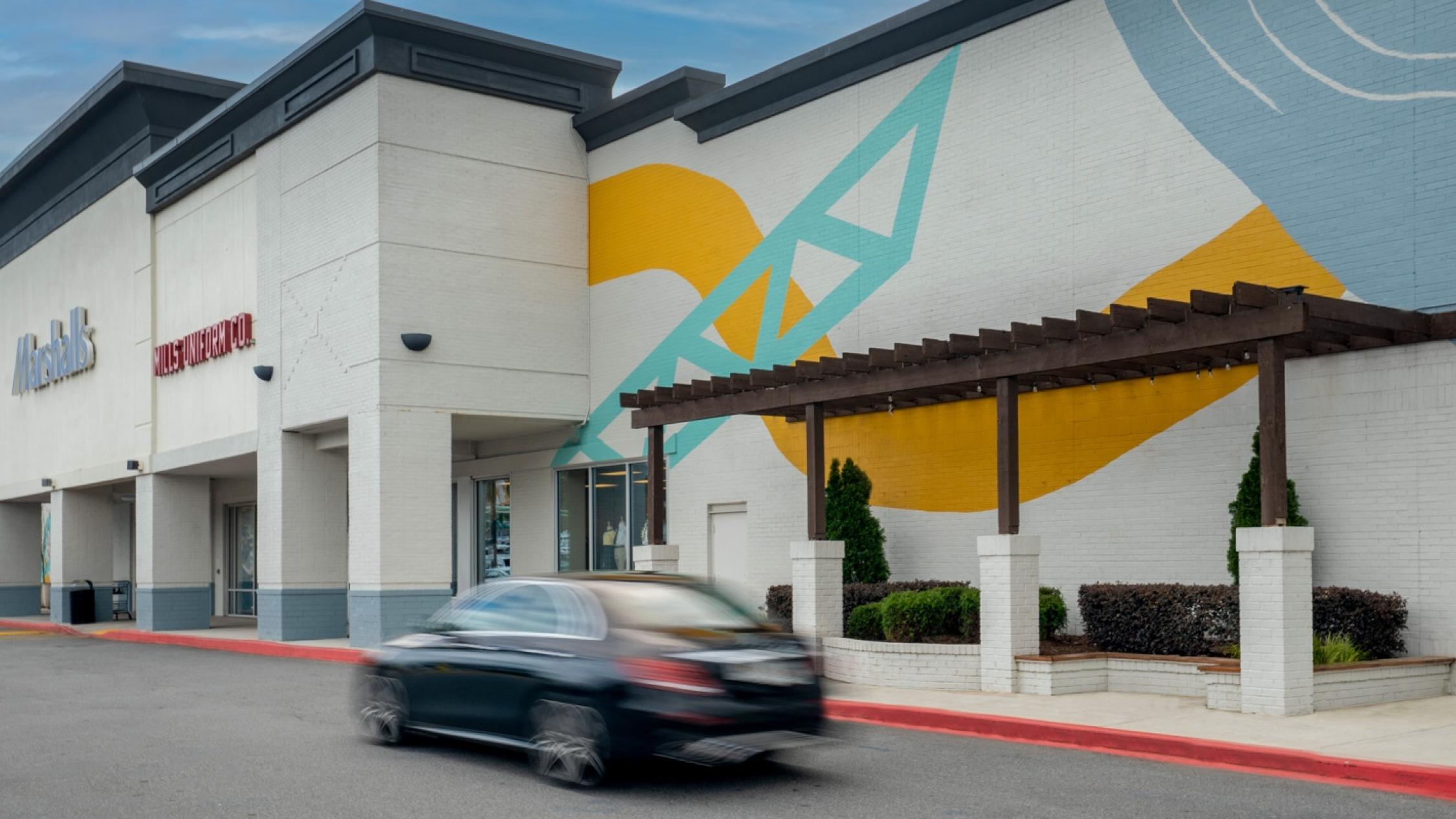 Marshall's exterior facade with car in driveway at Hammond Exchange