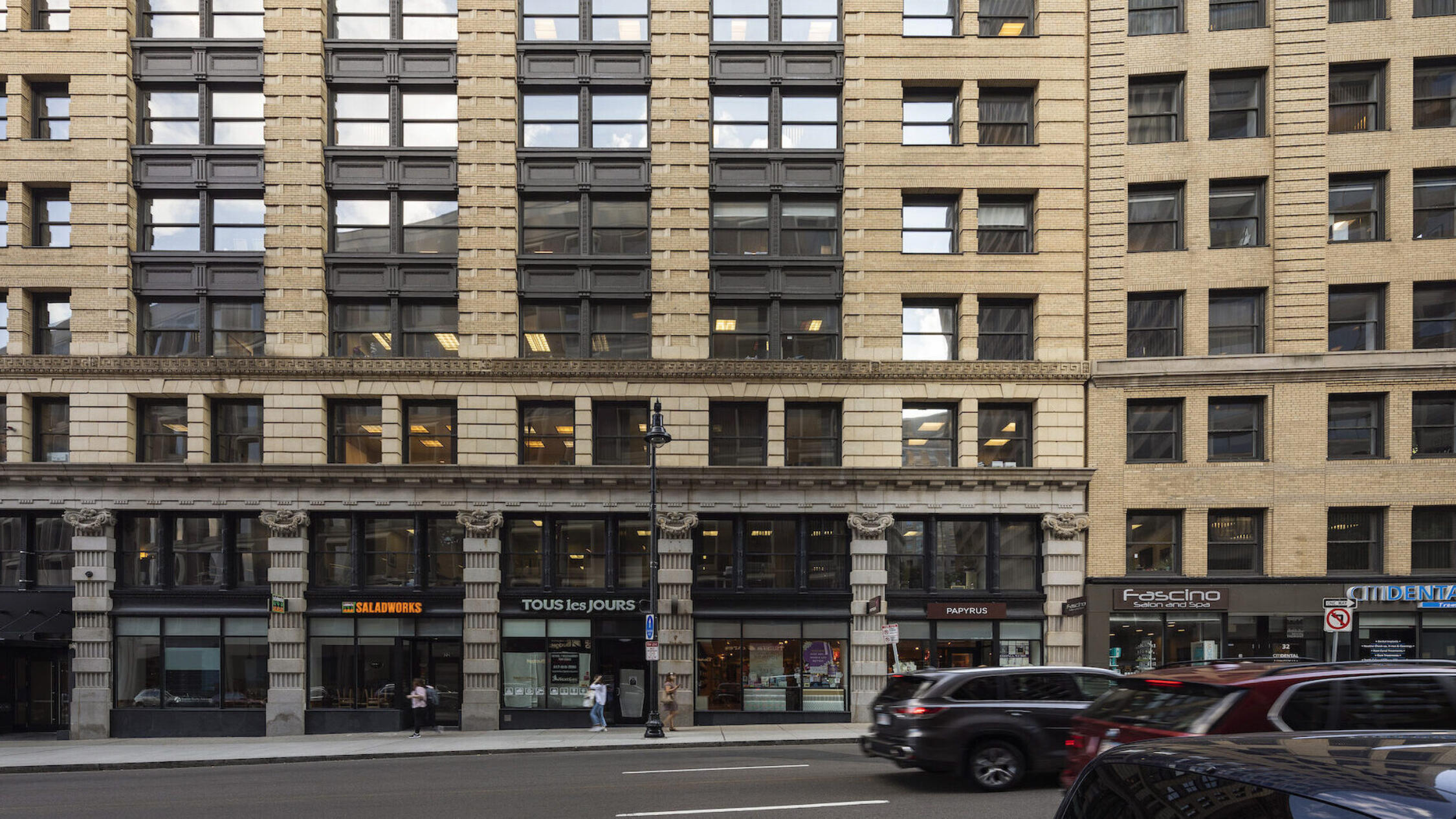 18 Tremont building facade with cars on street