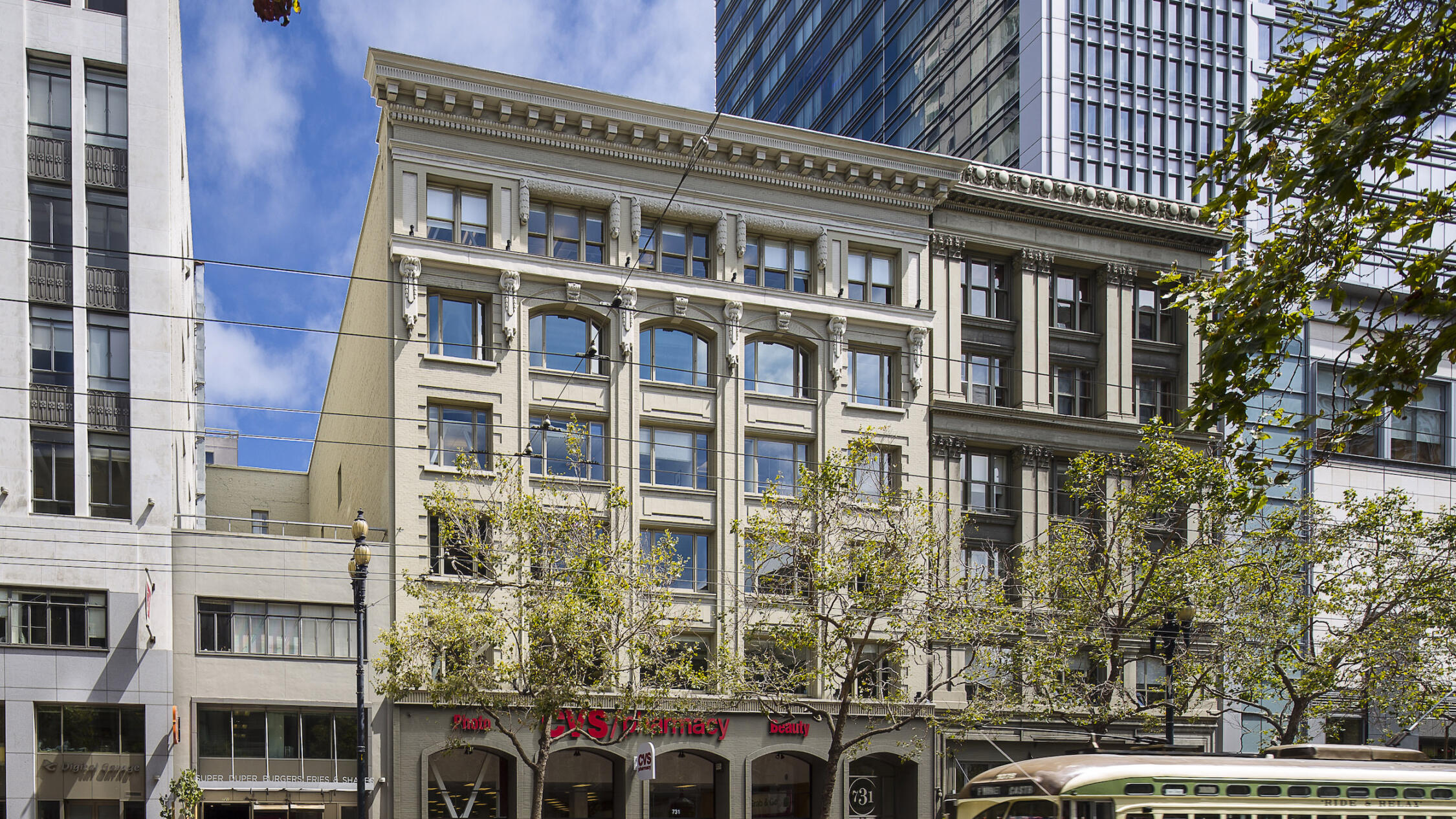 731 Market building facade with streetcar in front