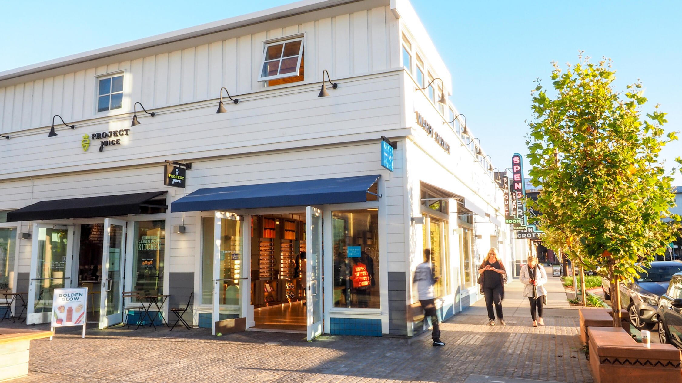 Fourth Street Berkeley retail store facades with pedestrians on sidewalks