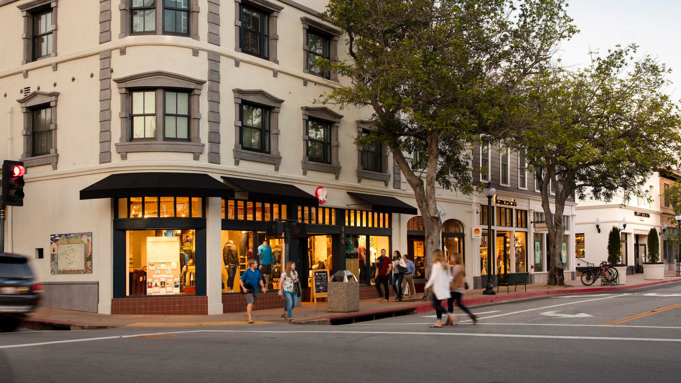 People walking outside of The San Luis Obispo Collection