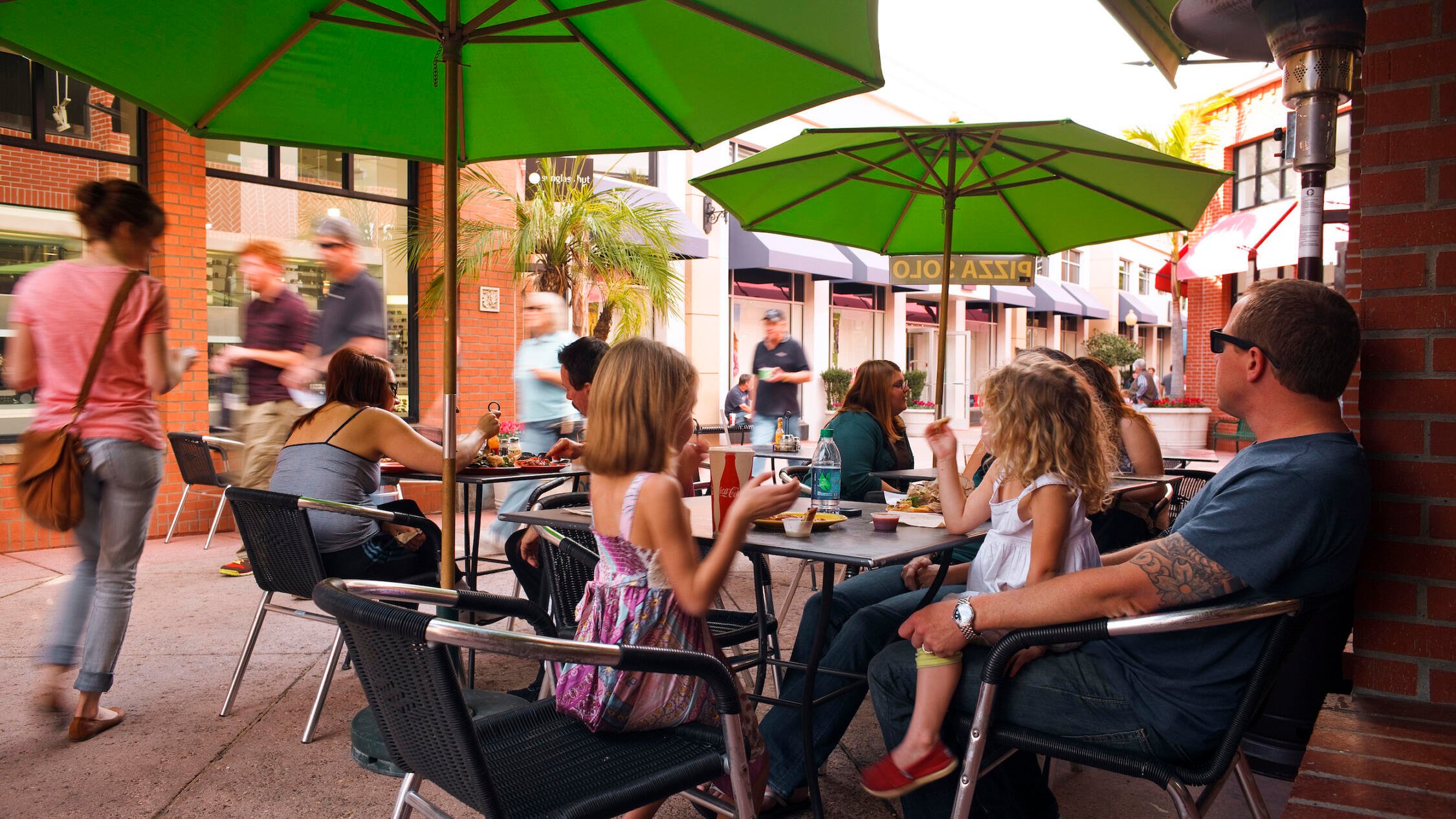 People sitting at outdoor cafe at The San Luis Obispo Collection