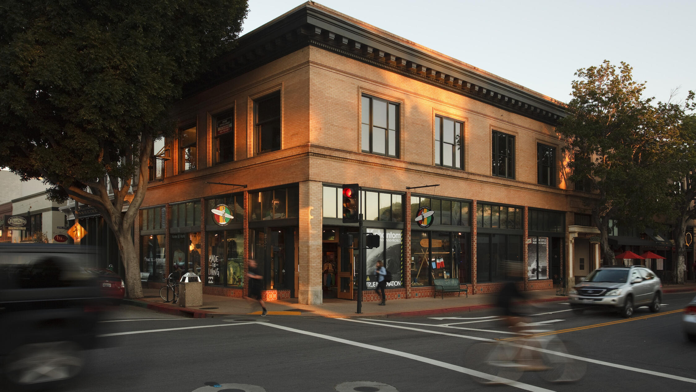 Street corner at The San Luis Obispo Collection with cyclist passing by