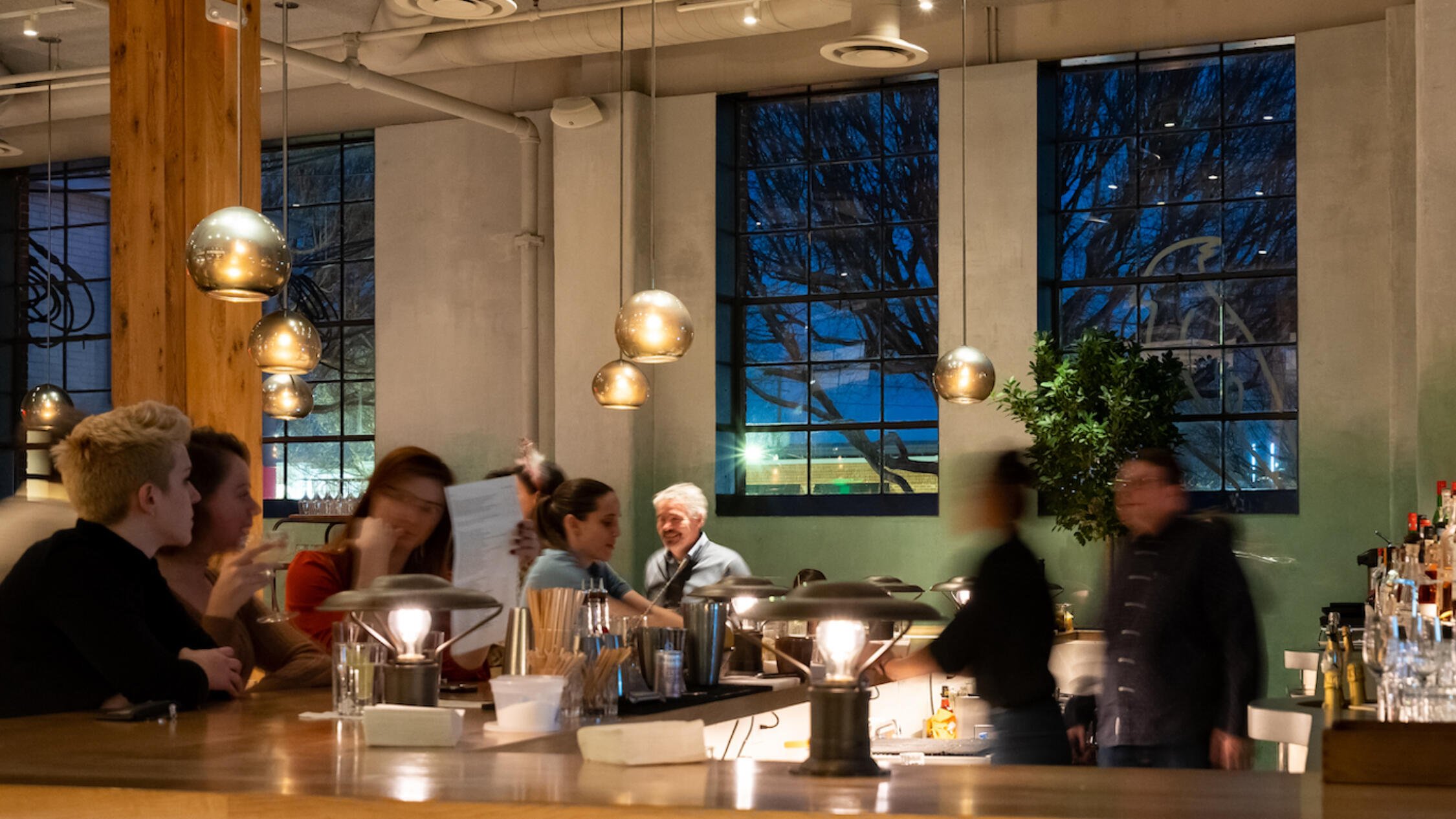 A lively bar at Westside Provisions District