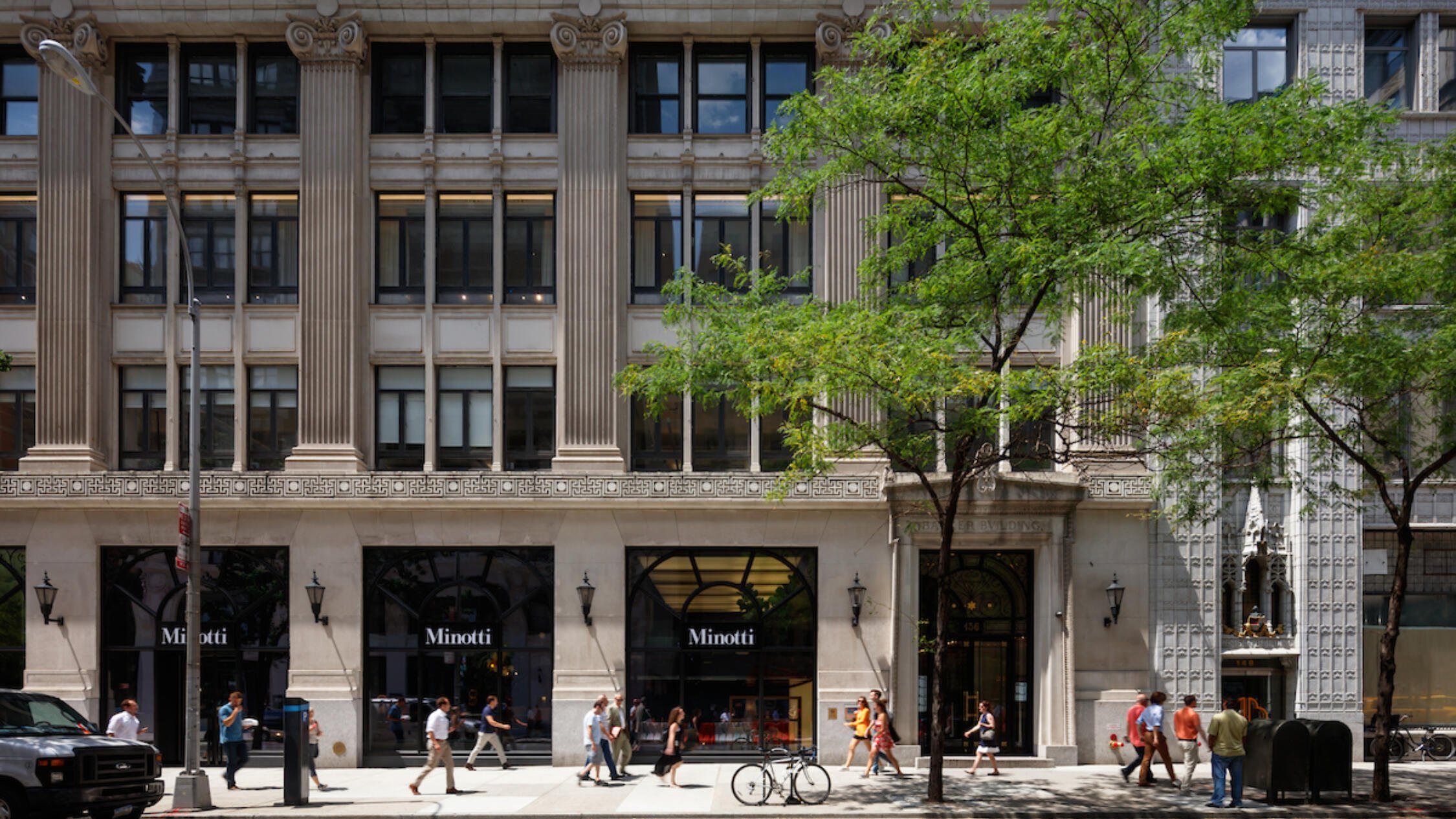 136 Madison exterior street level with people walking by