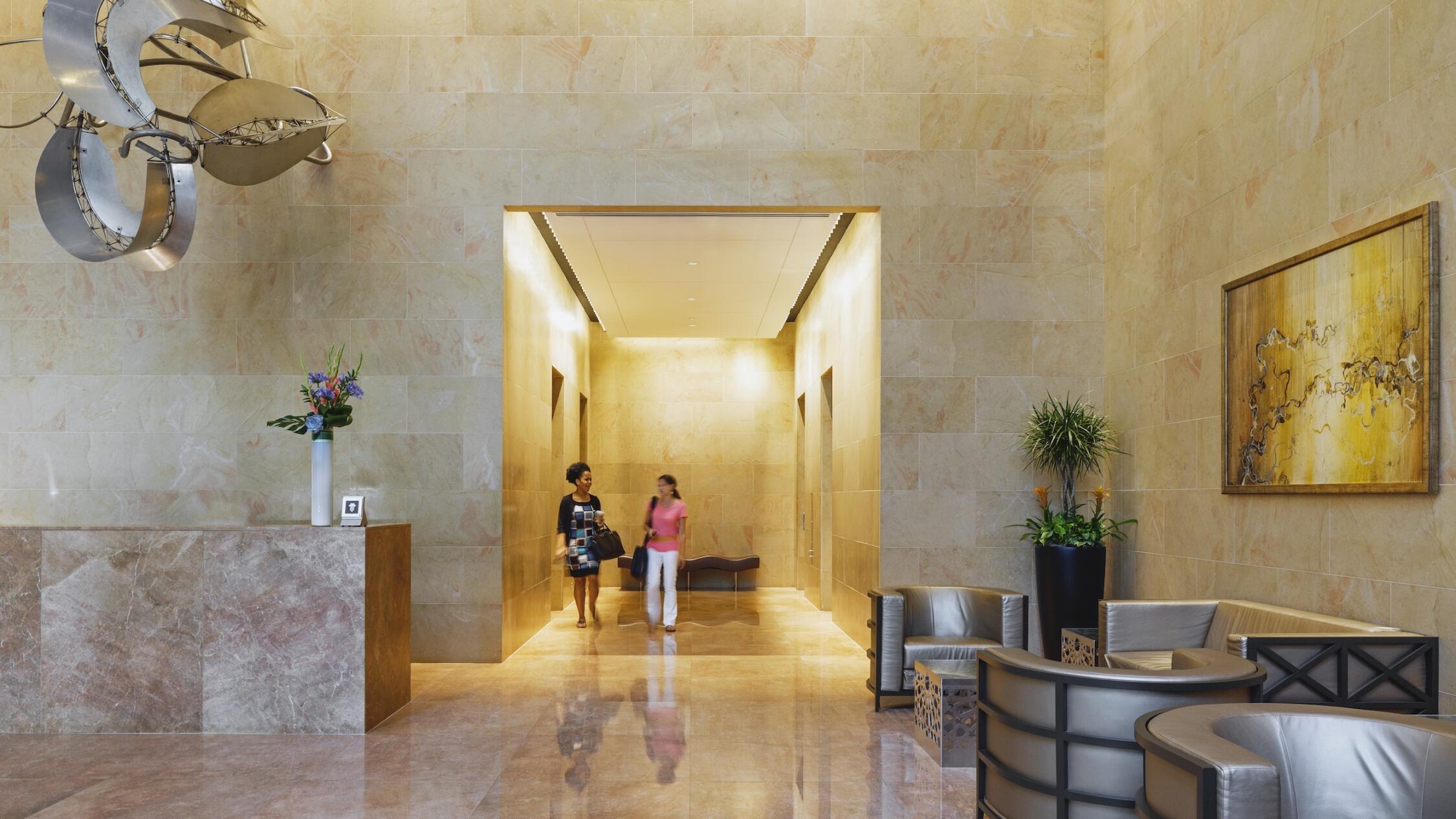 Lobby of One Metro Center with people walking through