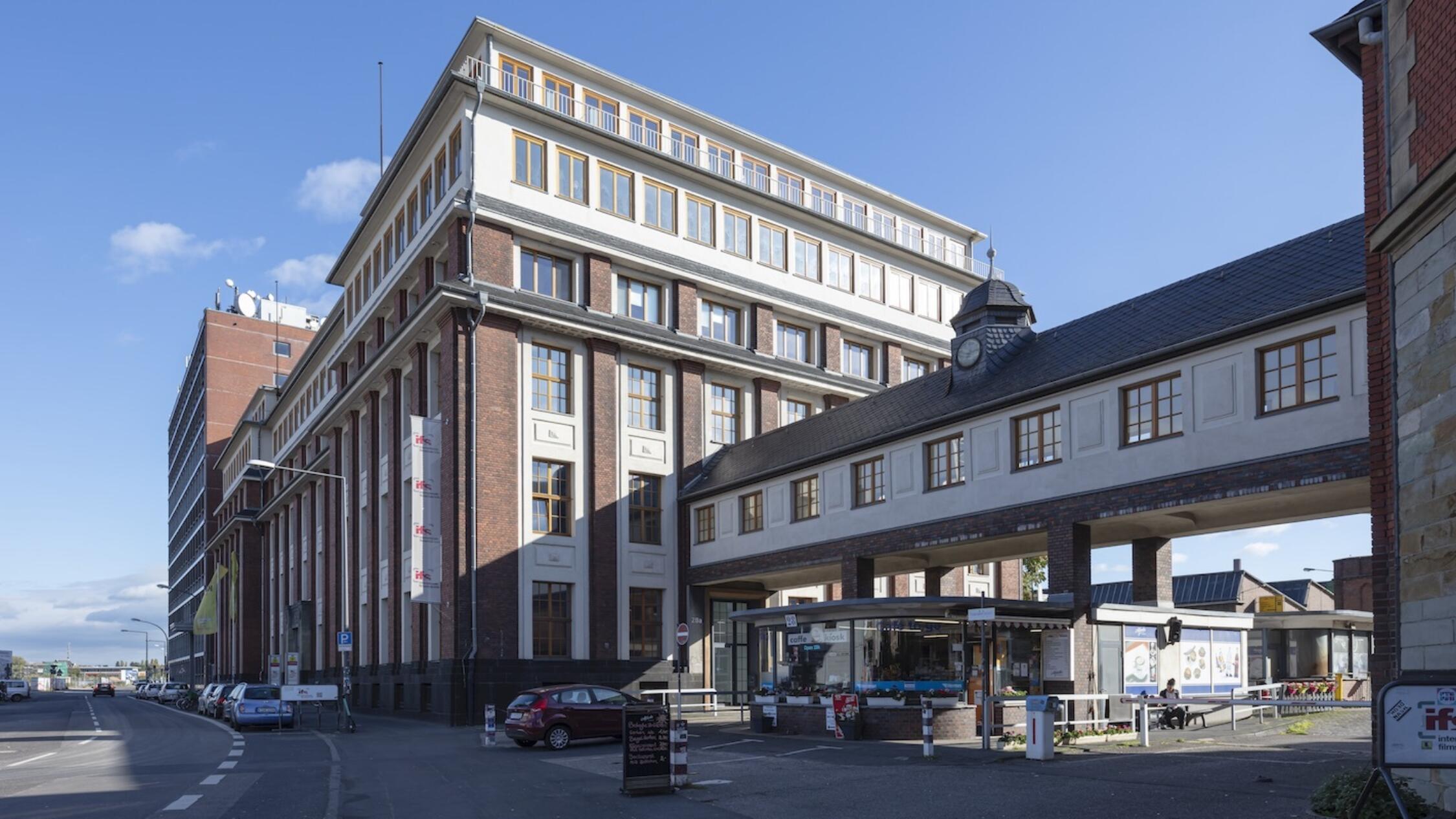 Schanzenstrasse facade with pedestrian footbridge connecting two buildings