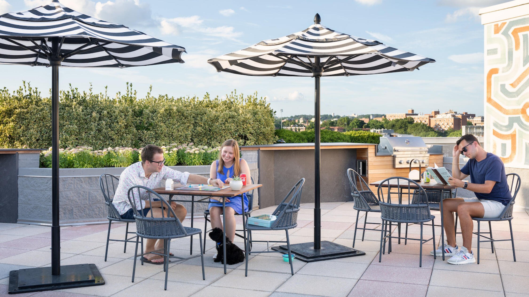 People sitting on the roof deck at The Ellington