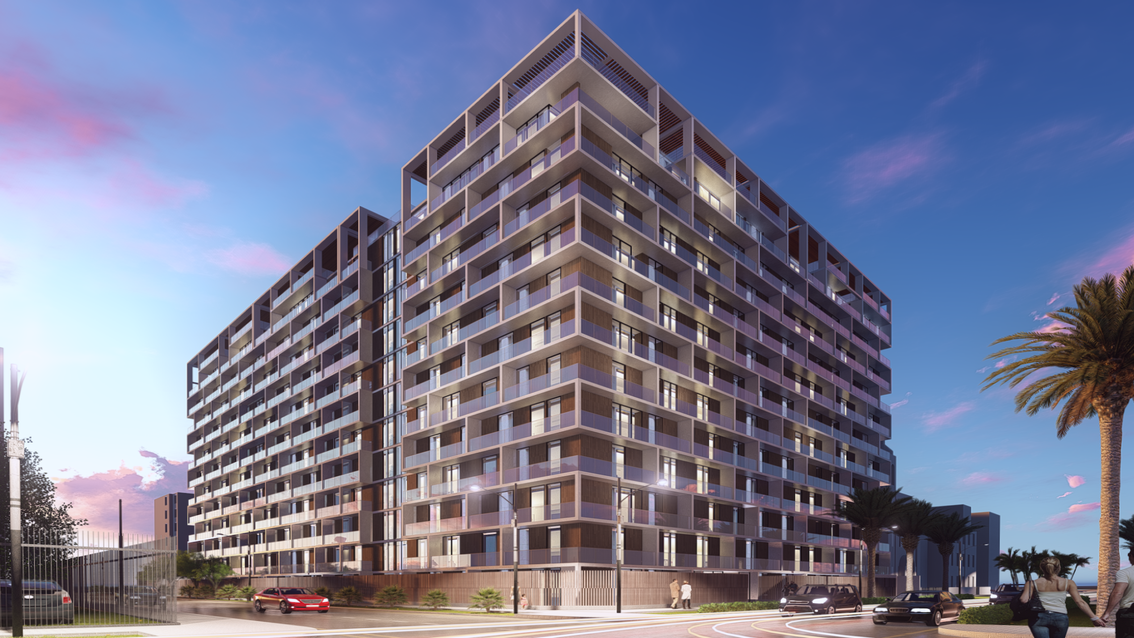 Rendering of apartment building with cars driving by and sunset sky behind