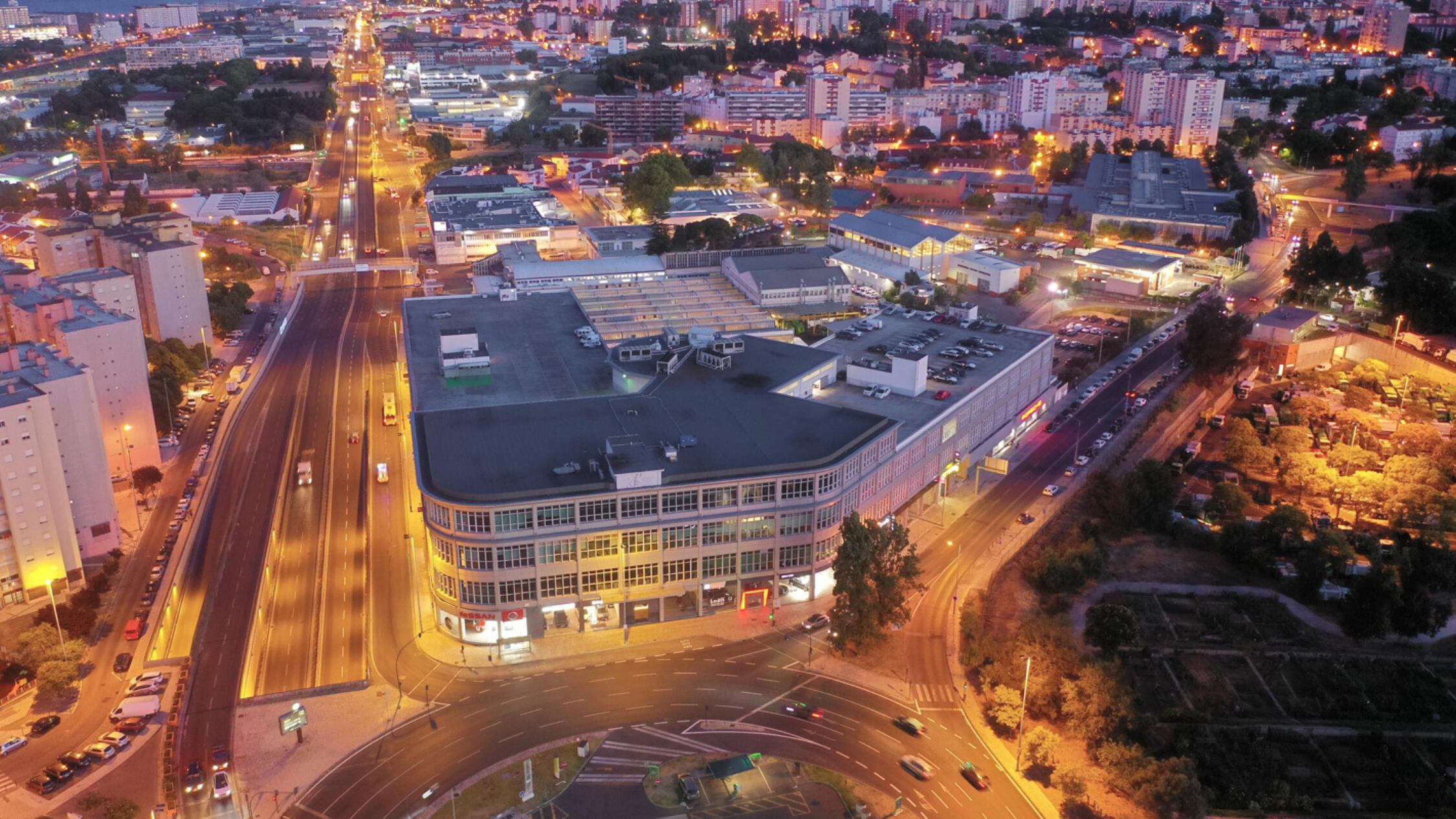 Aerial view of The Innovation & Design Building Lisbon at night