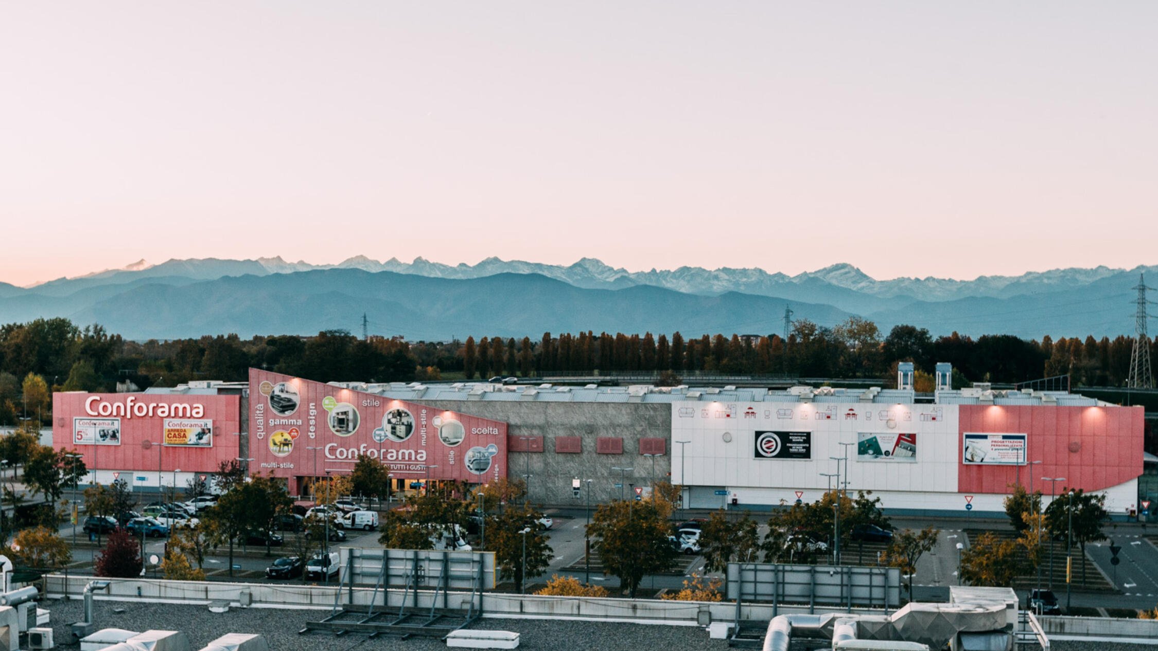 Settimo Cielo at dusk with mountains in background