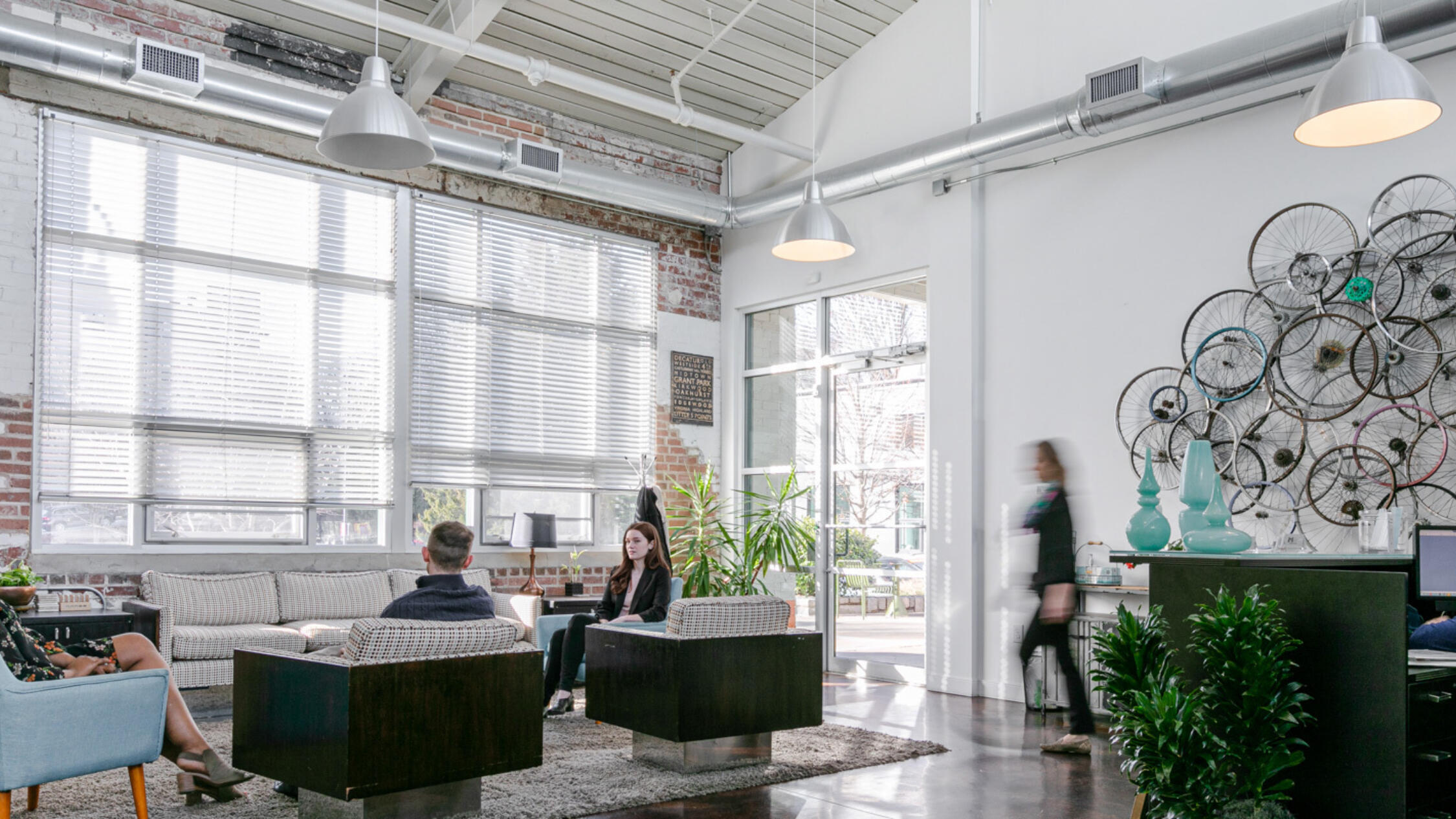Southern Dairies spacious open-office creative space with workers collaborating