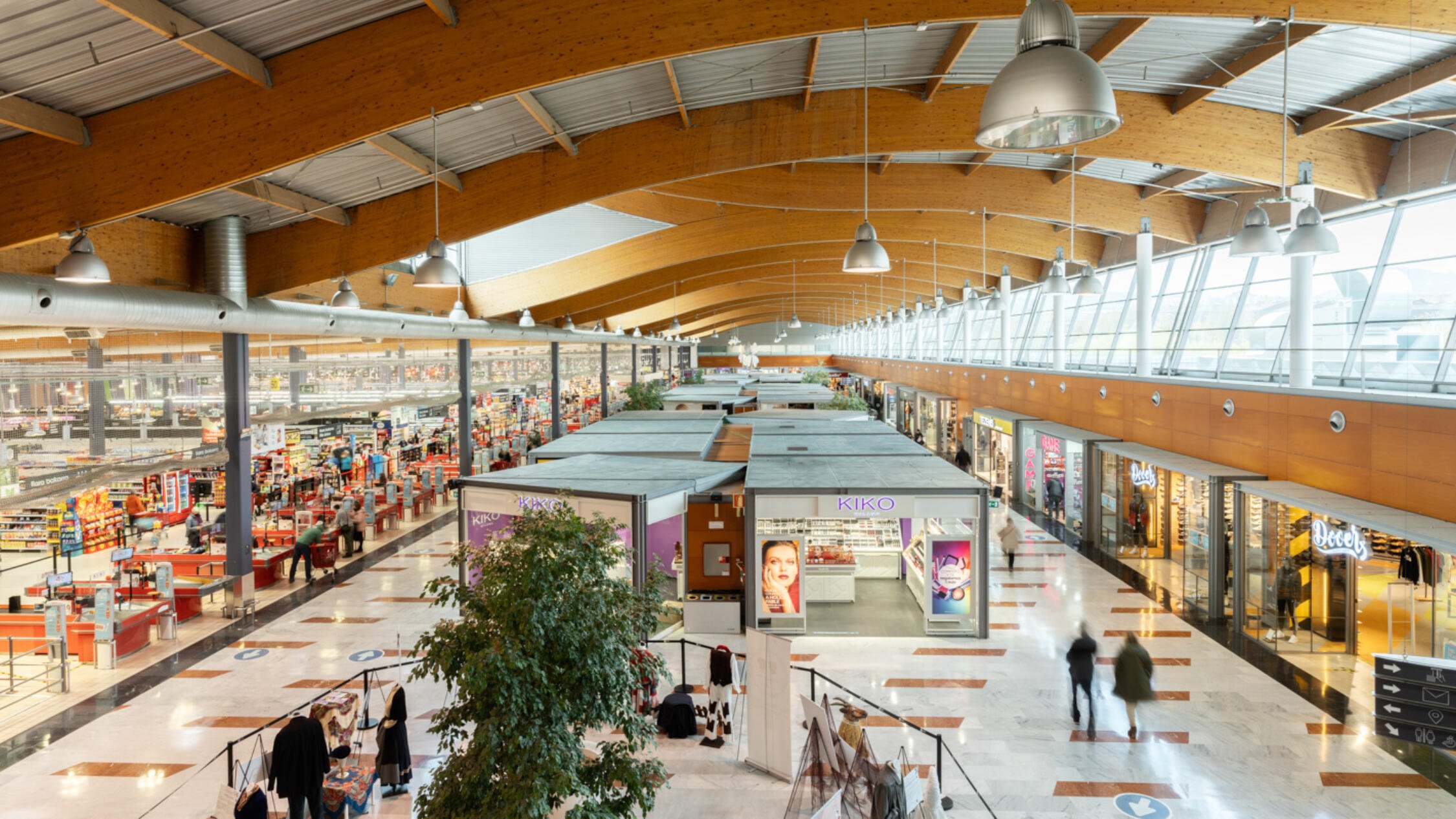 Urbil interior with shops and visitors