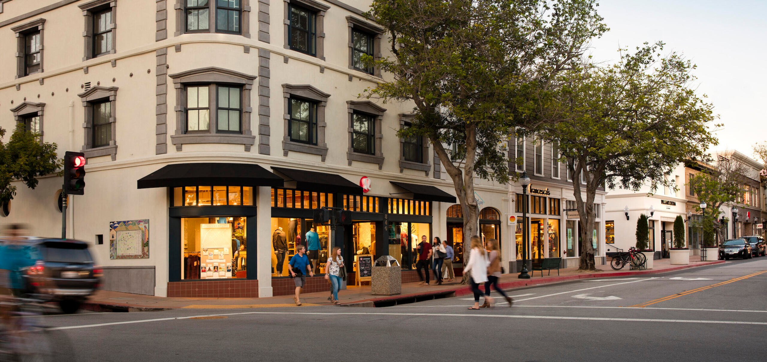 People walking outside of The San Luis Obispo Collection