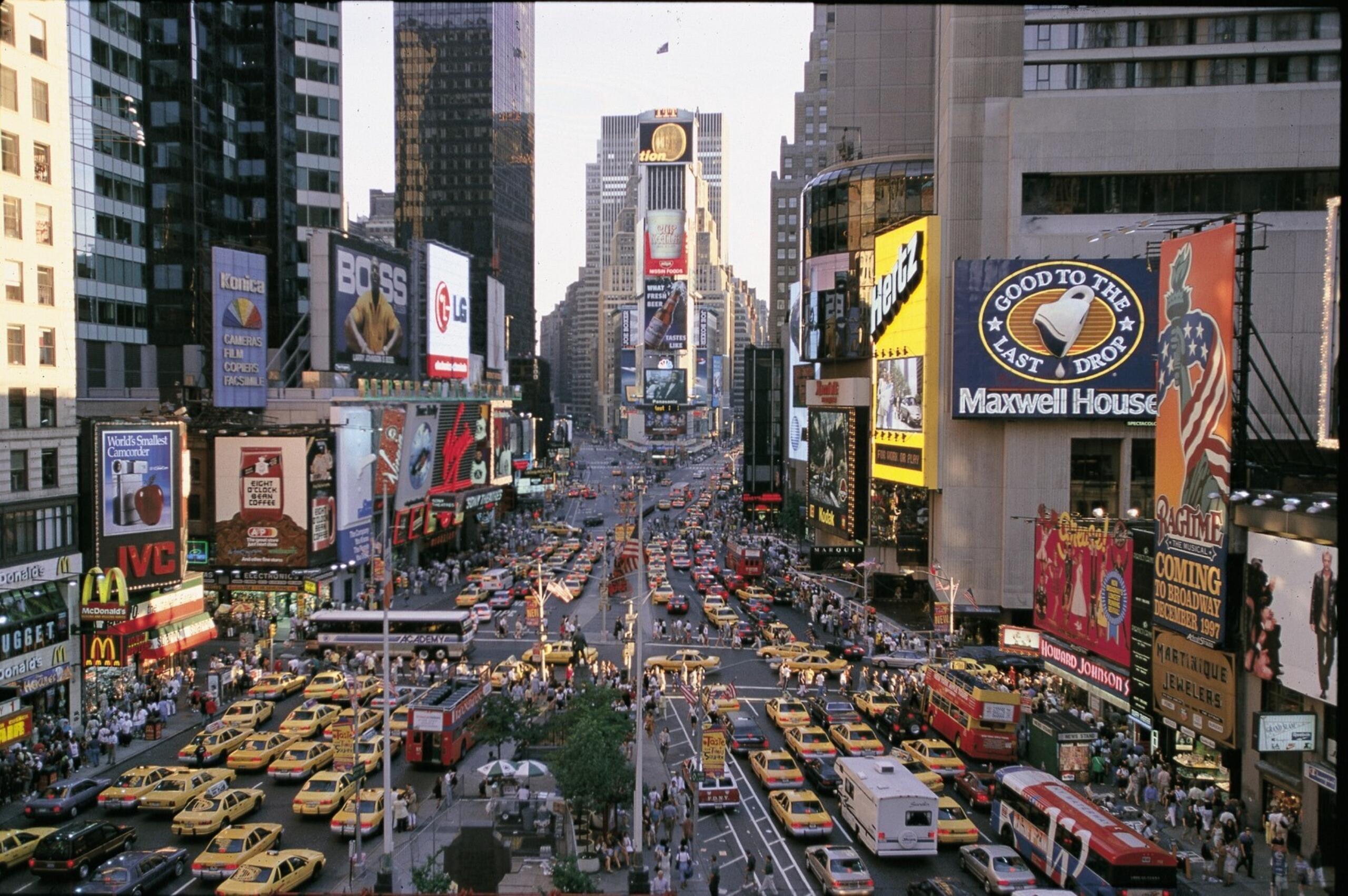 A late 1990s image of Times Square in New York City with One Times Square in the middle