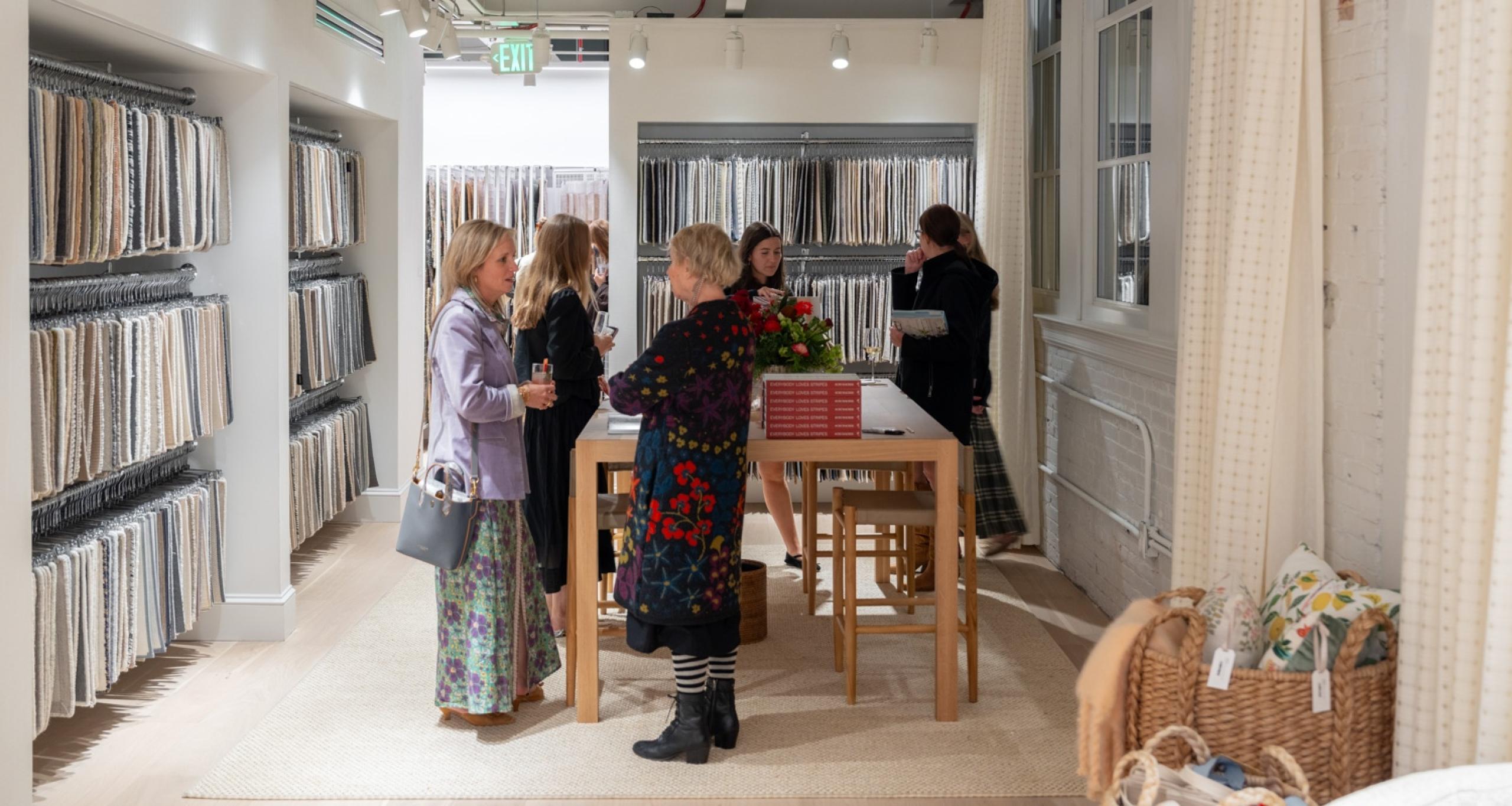 People shopping inside a fabric showroom at Charleston Design District