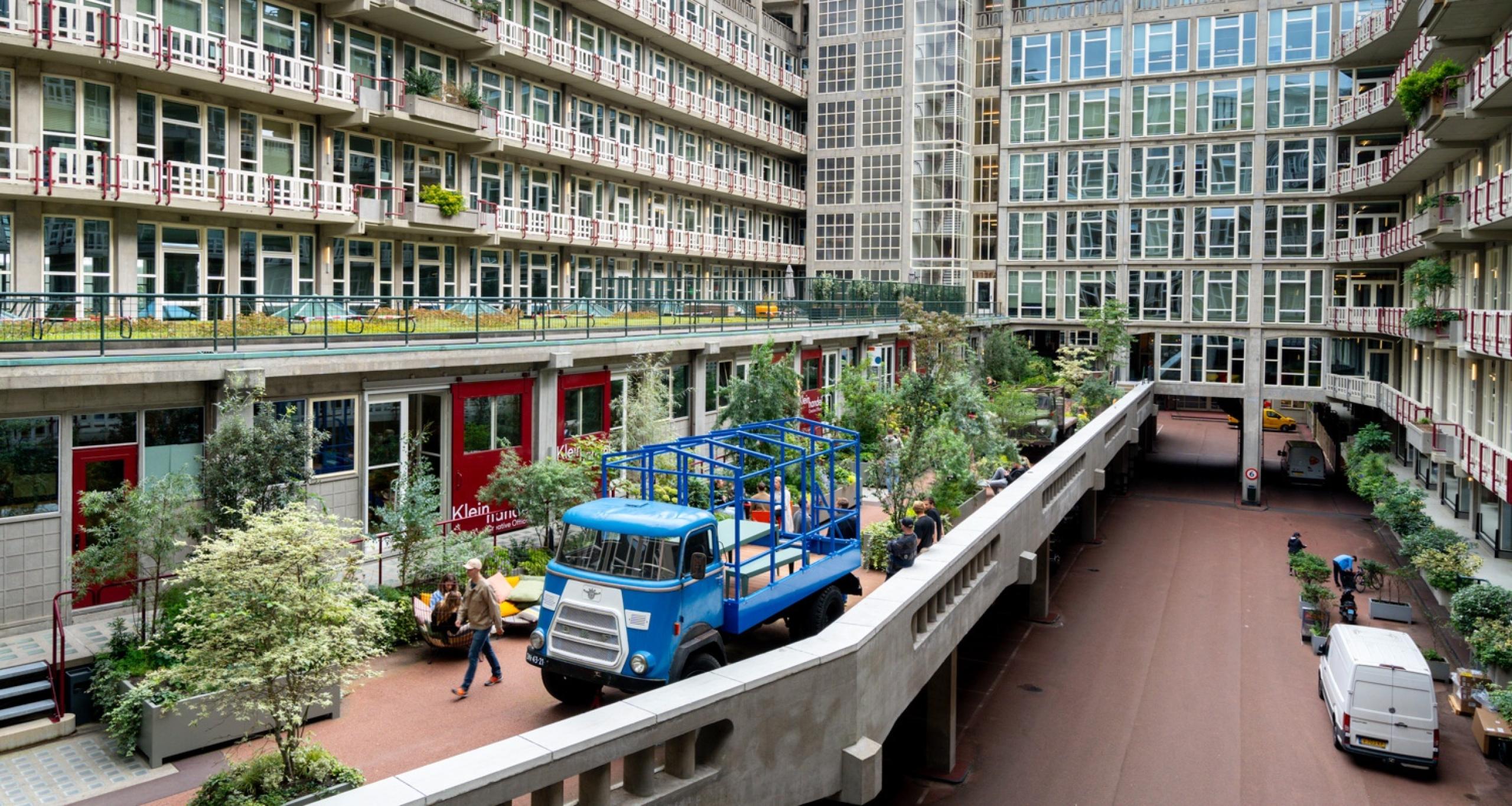 On outdoor greenspace in an outdoor common area at Groot Handelsgebouw