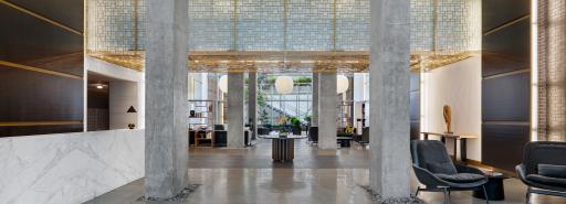 The stylish concrete lobby of 88 Leonard