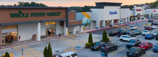 Low aerial view of storefronts and parking lot at Hammond Exchange