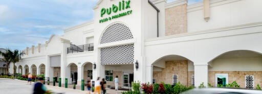 Shoppers approaching the main entrance of Publix at Polo Club Shops