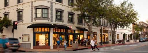 People cross the street at the San Luis Obispo Collection