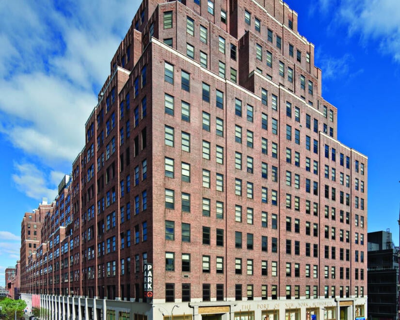 Wideshot of 111 Eighth Avenue under a blue sky