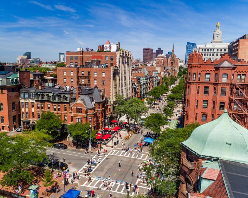 Rooftop view of the Newbury Collection in Boston on a bright clear day.