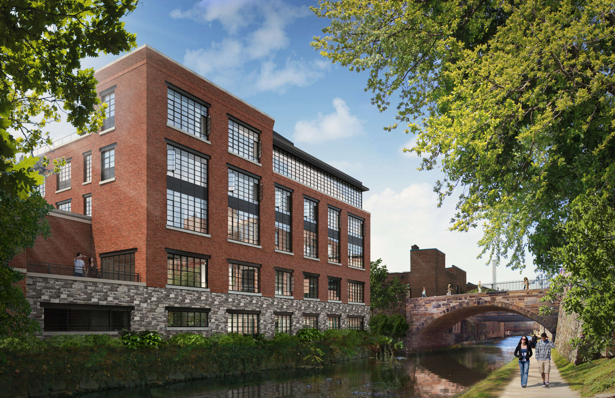 A rendering of a brick building on the river with people walking on the other side.