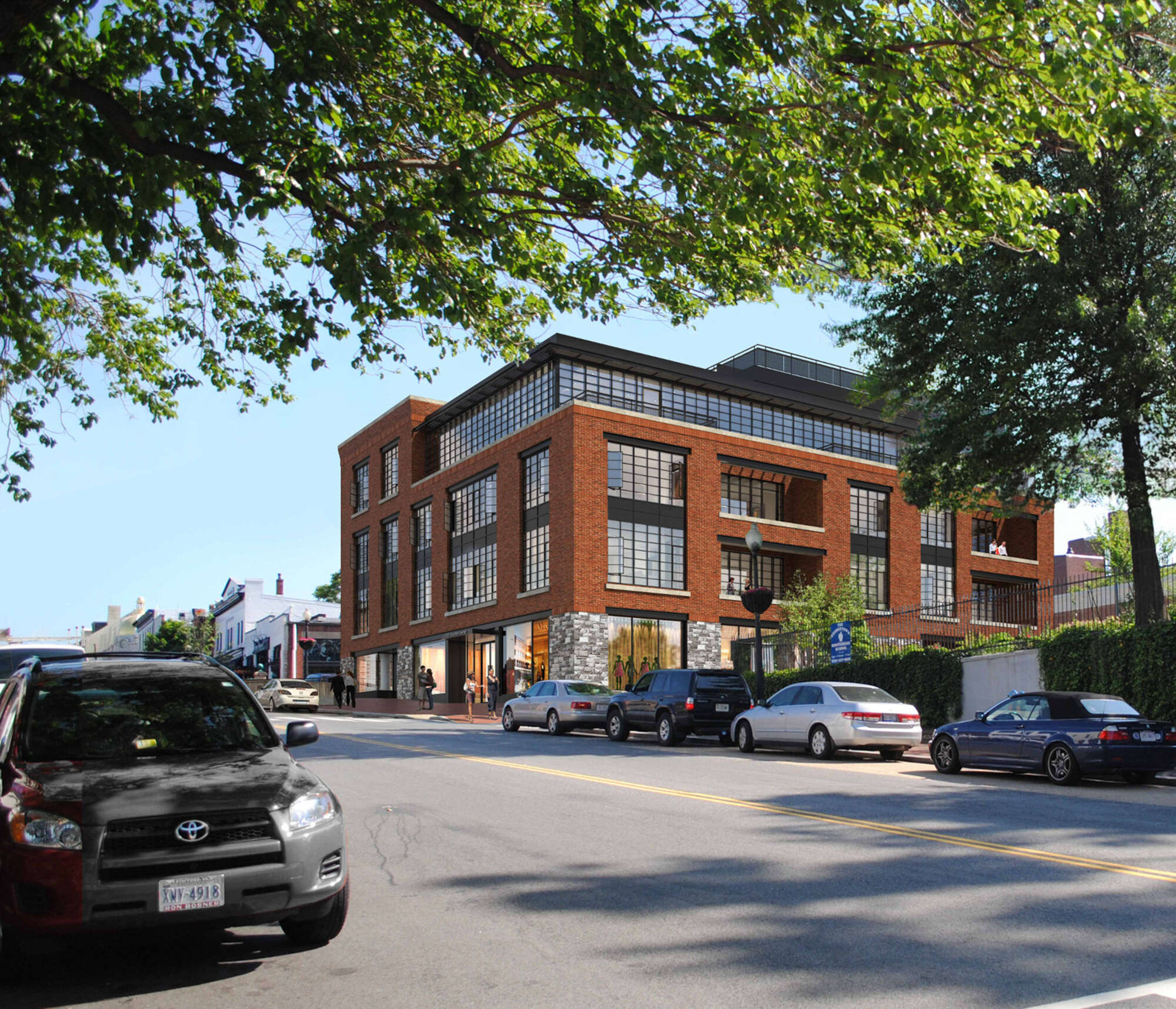 Rendering of brick building with street in foreground