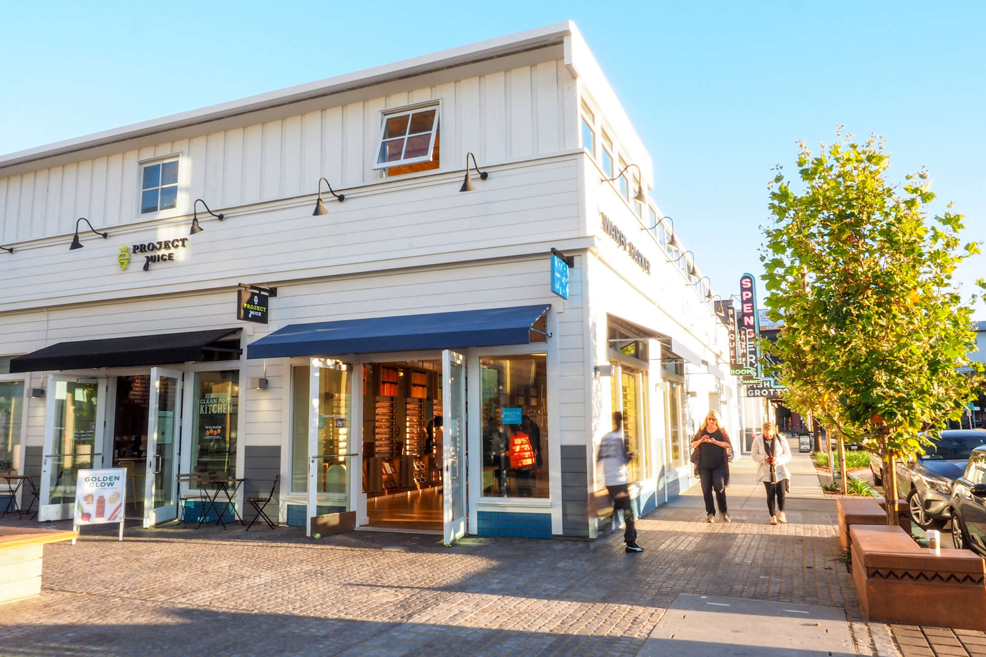Fourth Street Berkeley retail store facades with pedestrians on sidewalks