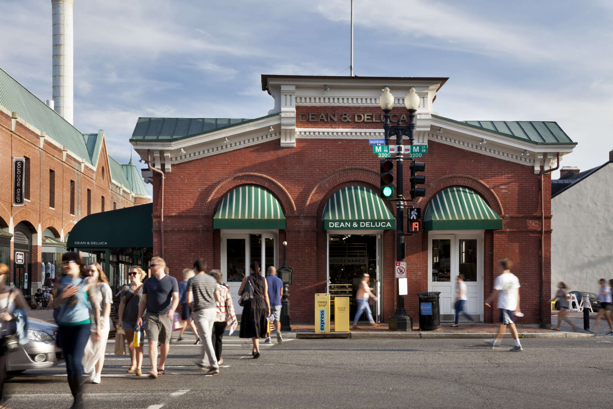 Georgetown Park retail shops exterior with pedestrians crossing street