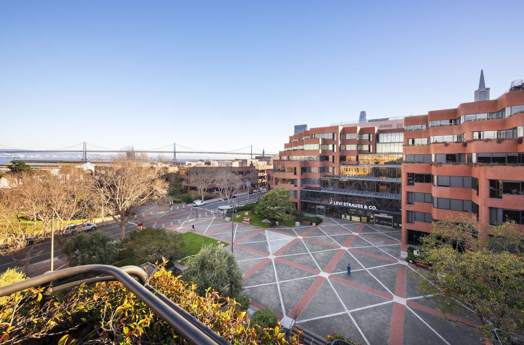 Exterior of Levi's Plaza in San Francisco with bridge in the distance