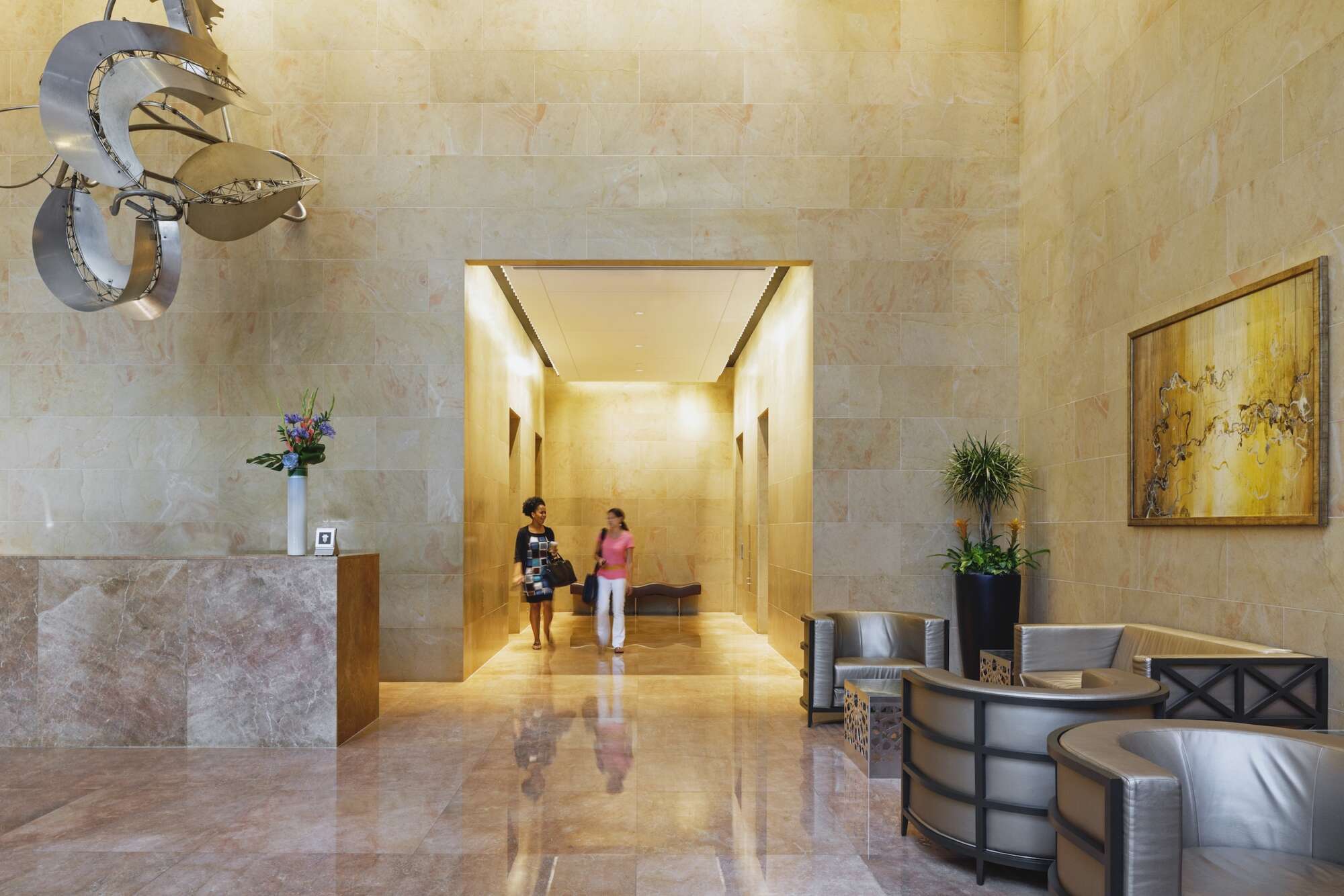 Lobby of One Metro Center with people walking through