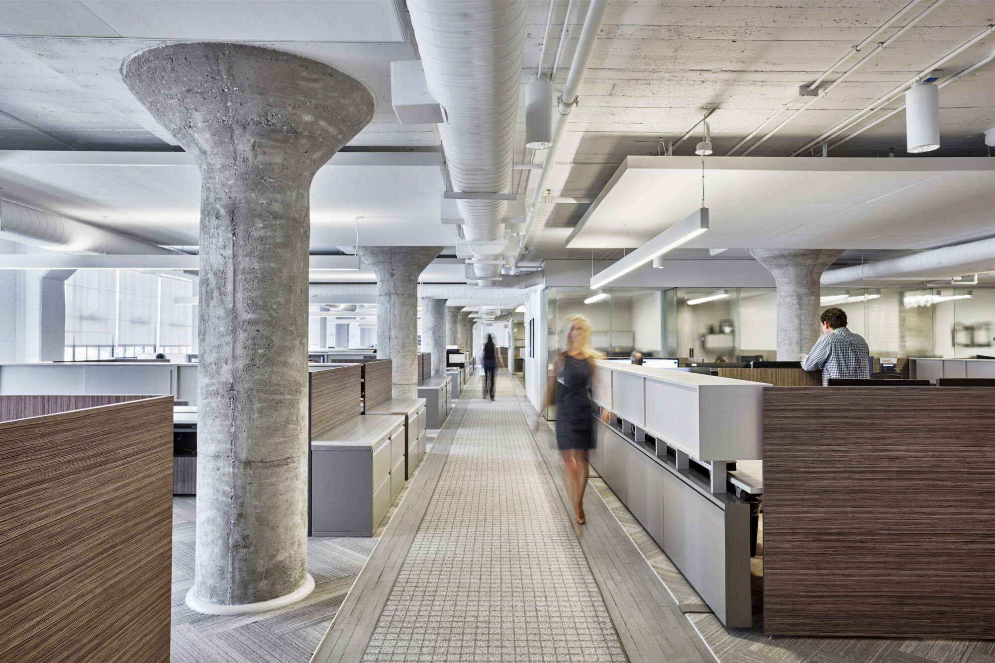 A woman walks through an office at Ponce City Market