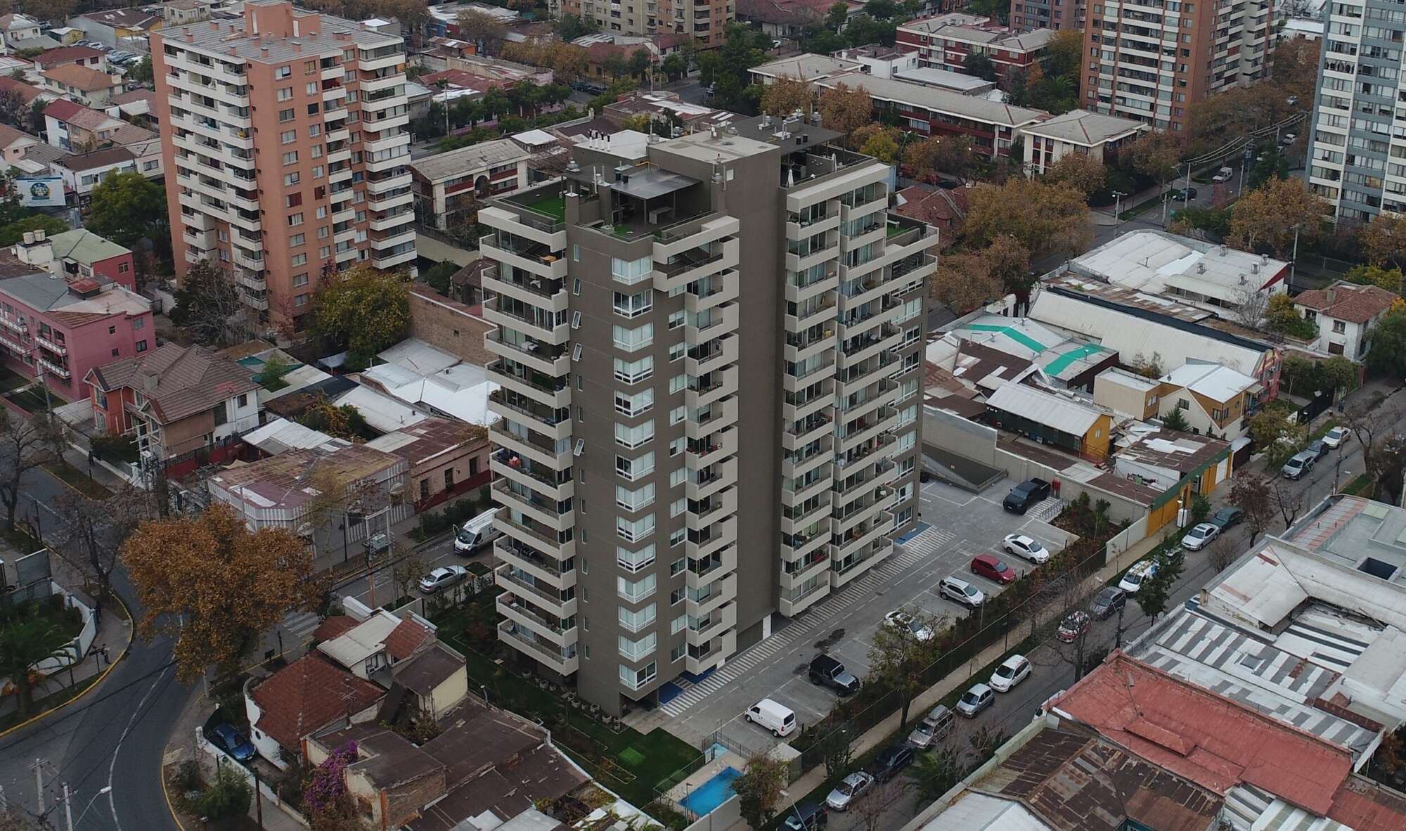 Brown and white apartment building from above